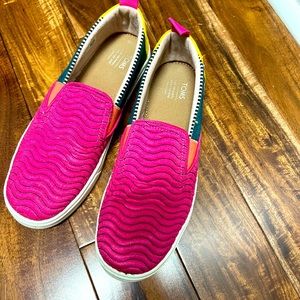 Toms shoes. Super cute and comfy.